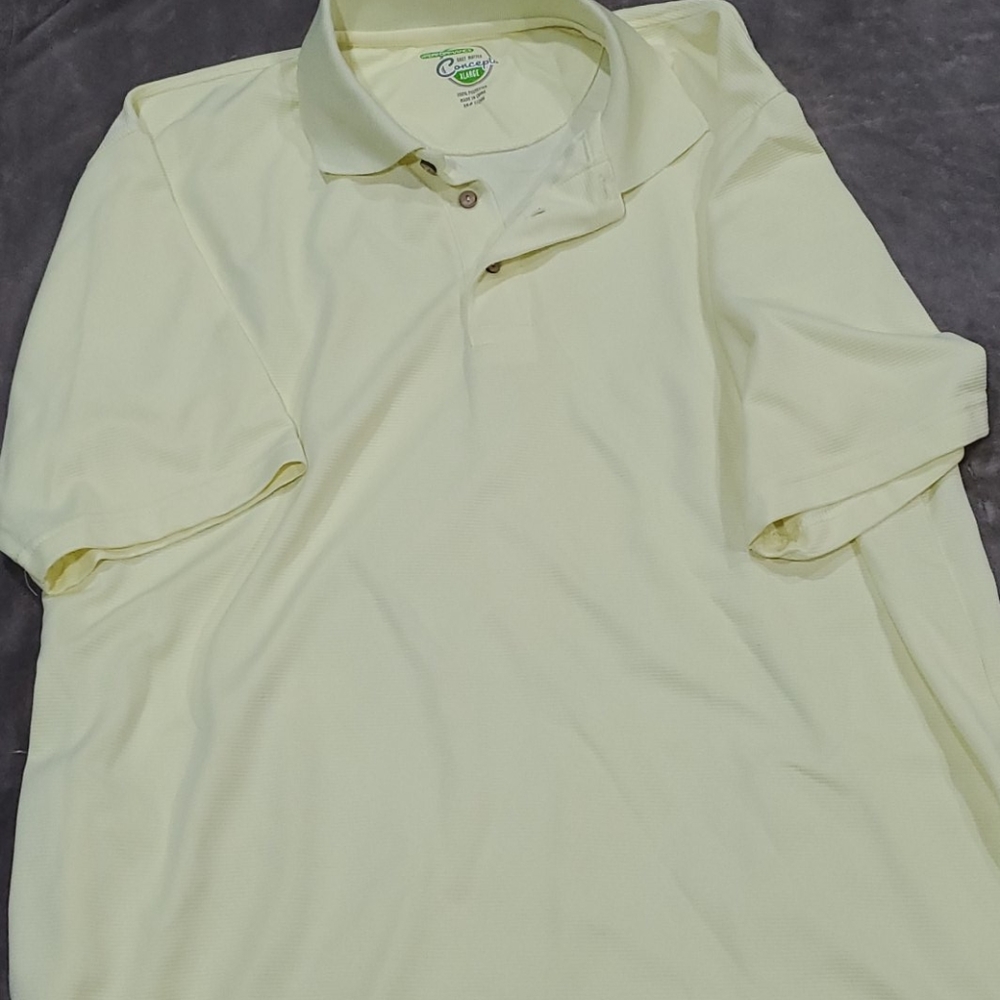 Yellow golf polo by Grey Matter Concepts